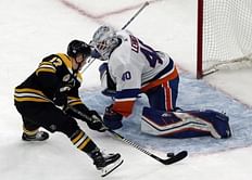 Donato nets shootout winner in return, Bruins best Isles 2-1