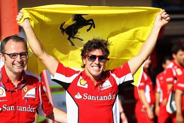 Fernando Alonso in a jubilant mood after his win at the European F1 Grand Prix, 2012