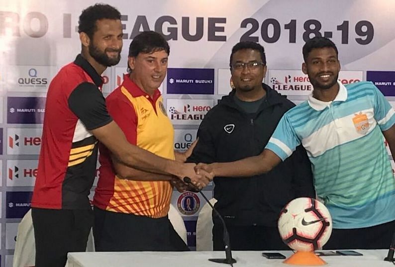 The coaches at the pre-match press conference