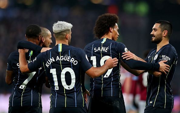 Manchester City players celebrate during their 4-0 thrashing of West Ham