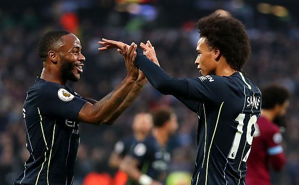 Sterling celebrates one of City&#039;s goals with Sane during their commanding victory