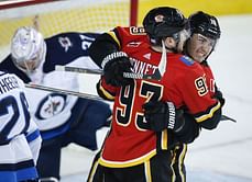 Flames score 5 goals in 1st period again to down Jets 6-3