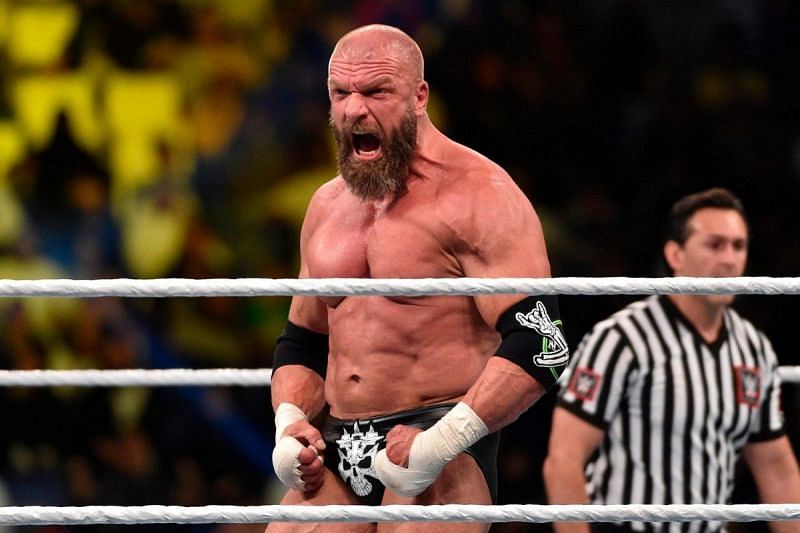 III - Triple H tears his pectoral muscle