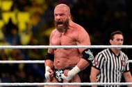 III - Triple H tears his pectoral muscle