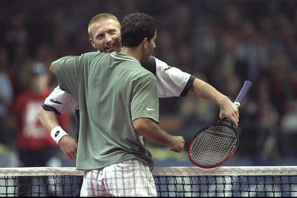 Pete Sampras is congratulated by Boris Becker
