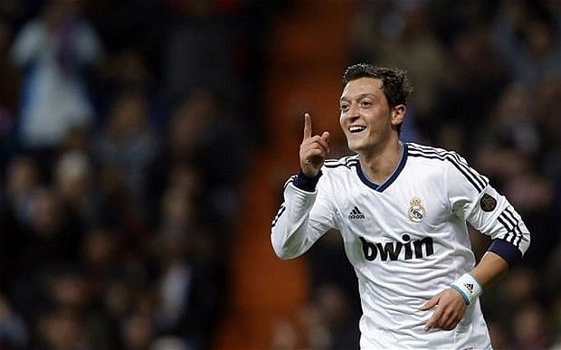 Mesut Ozil celebrates a goal during his time at Real Madrid