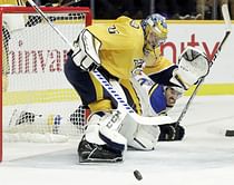 Rinne sets mark for Finnish goalies, Predators top Blues 4-1