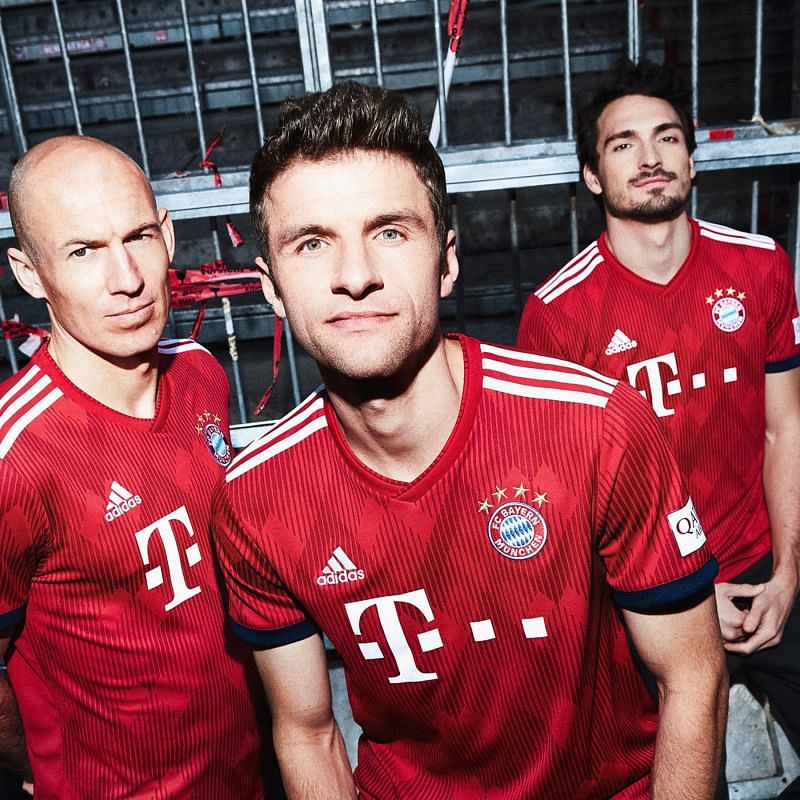 Muller, Robben, and Mats showcasing the new Home Kit