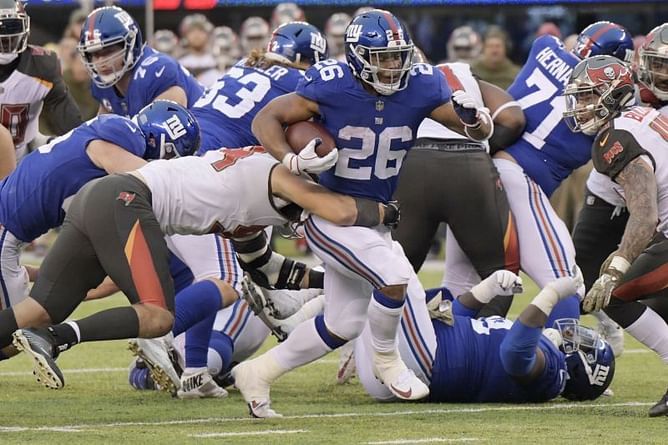 Barkley scores 3 TDs, Manning throws 2, Giants win again
