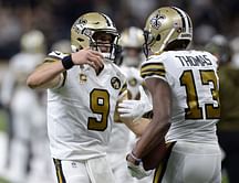 Brees, Saints singe sinking Eagles, 48-7