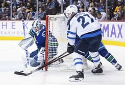 Laine's sixth hat trick lifts Jets past Canucks 6-3