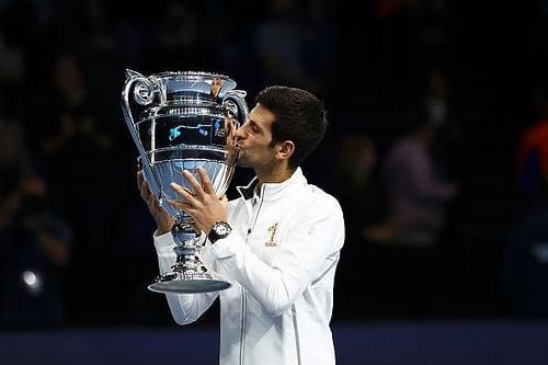 Djokovic with the ATP Year-End No. 1 trophy in London on Sunday