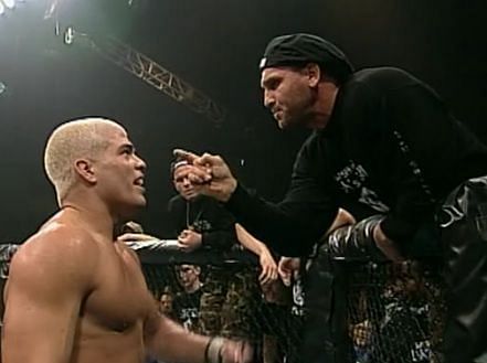 Ken Shamrock angrily confronts Tito Ortiz following the main event