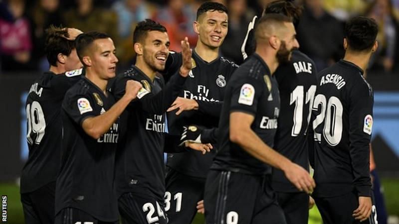Real Madrid players celebrate after scoring against Celta Vigo in La Liga