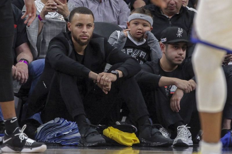 Steph Curry from the sidelines at a Warriors game