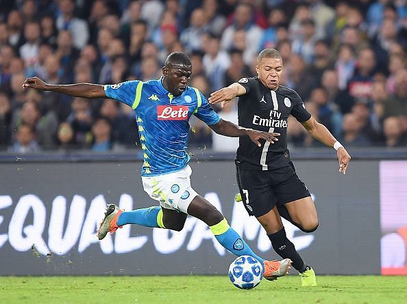 Napoli&#039;s Kalidou Koulibaly in a duel with Kylian Mbappe during the UEFA Champions League Group C match at the Stadio Sao Paolo