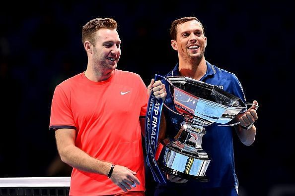Jack Sock and Mike Bryan with the 2018 Nitto ATP Finals Trophy
