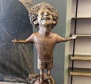 Liverpool's Mo Salah responds to infamous statue of himself, contacts sculptor