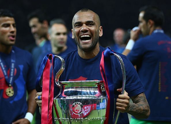 Dani Alves with the UEFA Champions League trophy in 2015