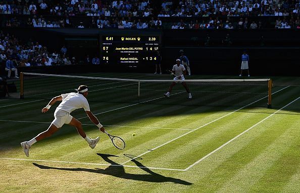 An outstretched Del Potro produces a remarkable winner against Nadal at the Wimbledon Championships 2018