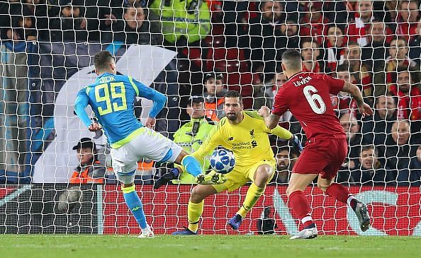 Alisson saved Arkadiusz Milik&#039;s shot in injury time to send Liverpool through to the knockout stages