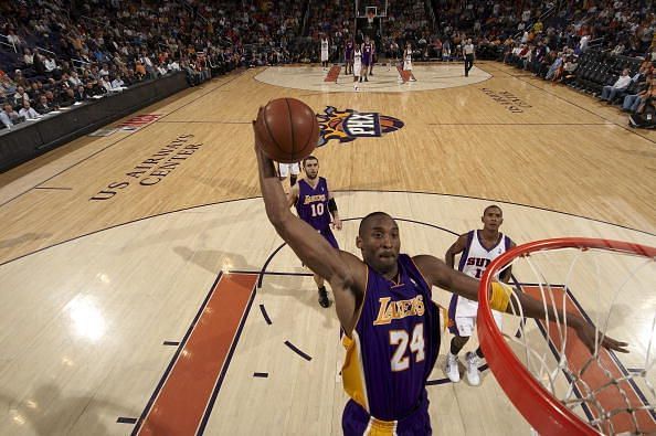 Bryant dunks it against the Suns