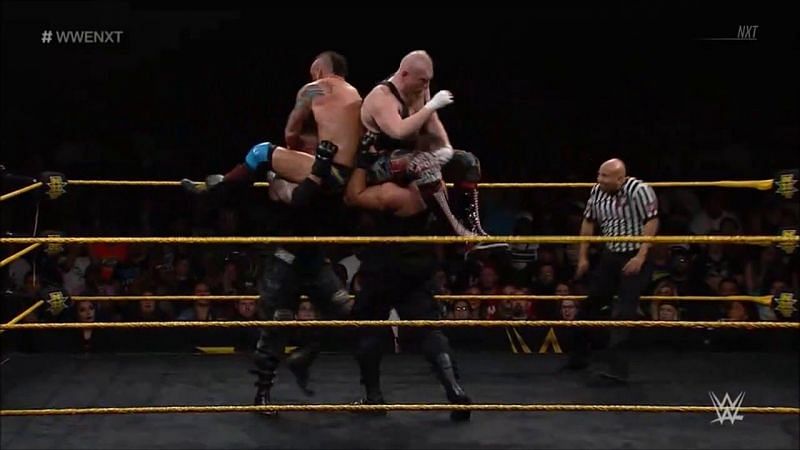 Akam and Rezar drive their opponents together with tandem powerbombs, affectionately known as the Super Collider