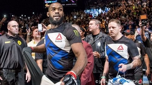 Jon Jones with Brandon Gibson (right)