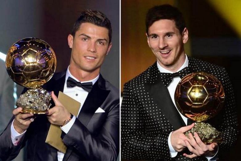 Cristiano Ronaldo and Lionel Messi with their Ballon d&#039;or award