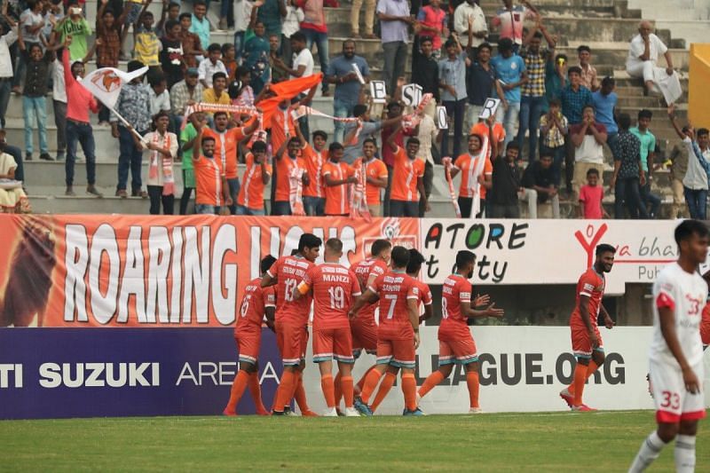 Chennai City players celebrate after a goal against Shillong Lajong