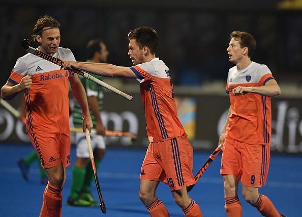 Netherlands&#039; players celebrate after scoring against Pakistan in the Pool stage