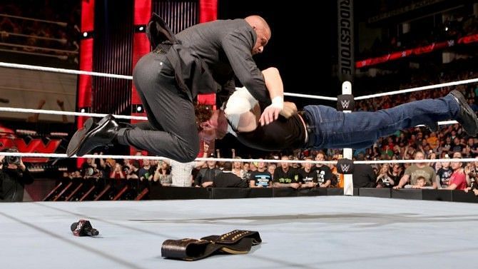 Image result for Triple H pedigreeing Dean Ambrose