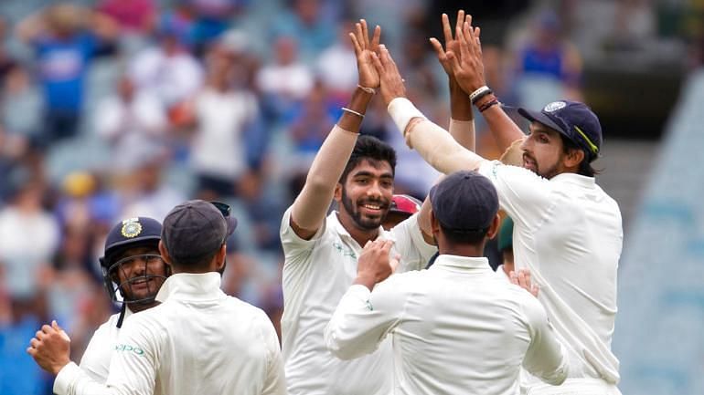 Team India celebrate after dismissing Pat Cummins