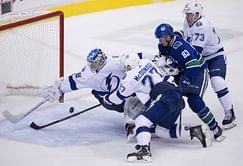 Kucherov, Lightning beat Canucks 5-2 in fight-filled game