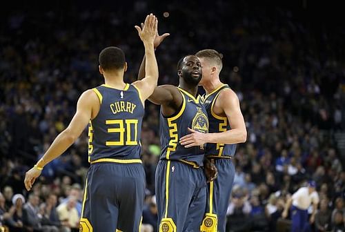 Golden State Warriors stars Stephan Curry and Draymond Green in action.