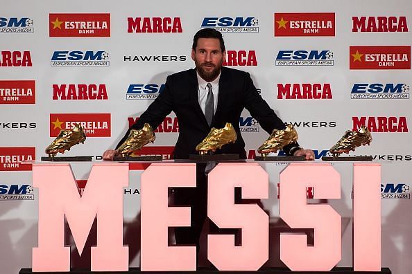 Lionel Messi receiving Golden Shoe award