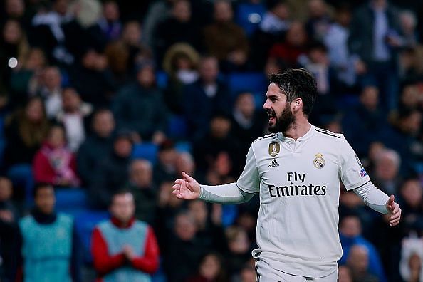 Isco reacts as the Bernabeu crowd boos him