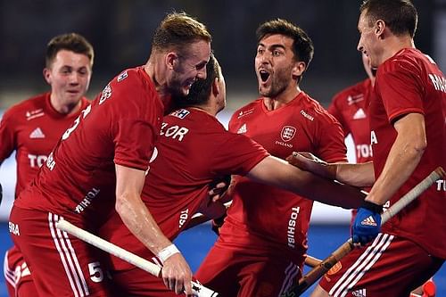 English players celebrate after scoring a goal