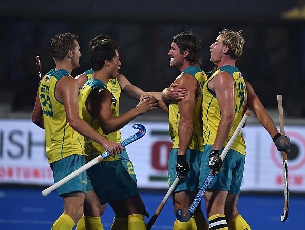 Australian players celebrate after scoring a goal against France in the quarterfinal