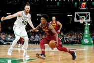 Aron Baynes (L) and Collin Sexton (R)