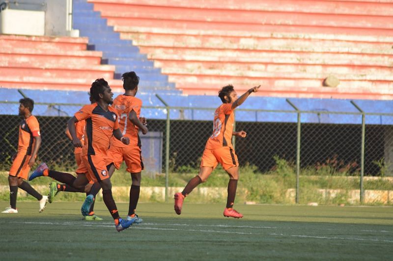 Sooraj of South United FC wheels away in celebration having scored the game&#039;s only goal
