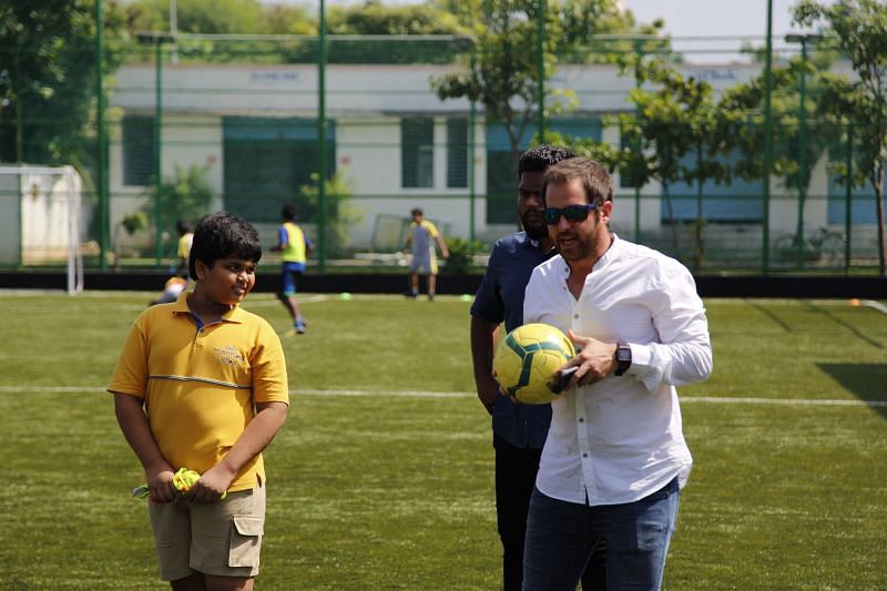 South United Football Club Head Coach Miquel Llado with the students of Vaels International School