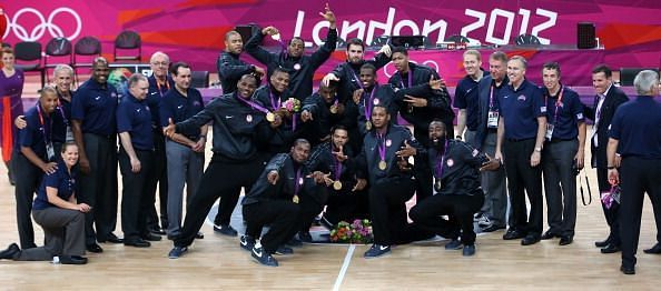 The team poses after the gold medal game