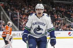Pettersson, Roussel power Canucks past Oilers 4-2