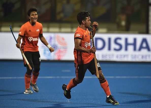 Faizal Saari's powerful drag-flick helped Malaysia level the score