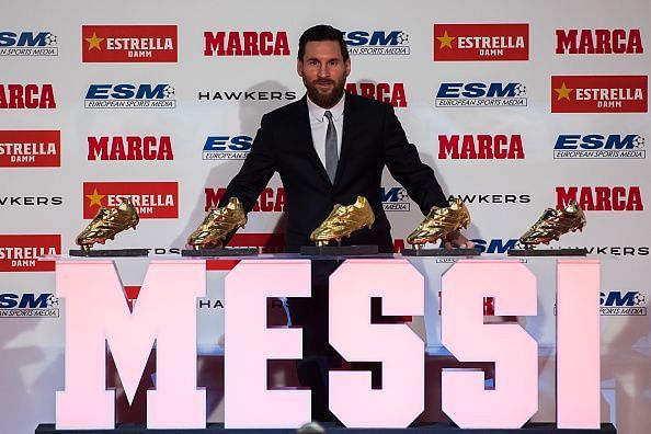 Lionel Messi receiving the Golden Shoe award