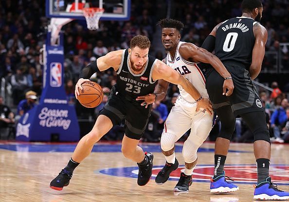 Blake Griffin driving against Jimmy Butler