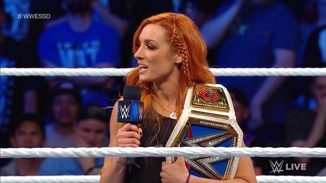 Becky Lynch with her title