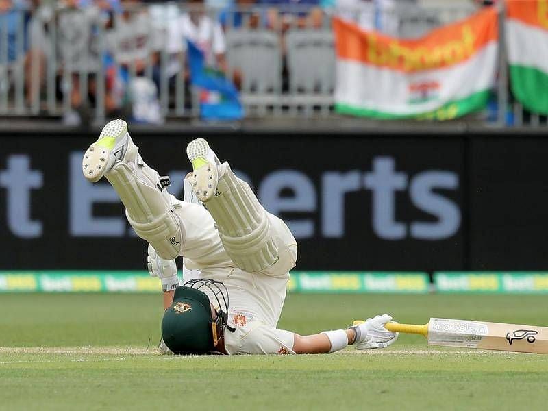 Harris fell on the ground after being hit by a bouncer from Bumrah