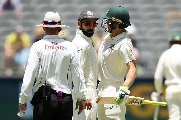 Virat Kohli and Tim Paine exchange words during the Perth Test